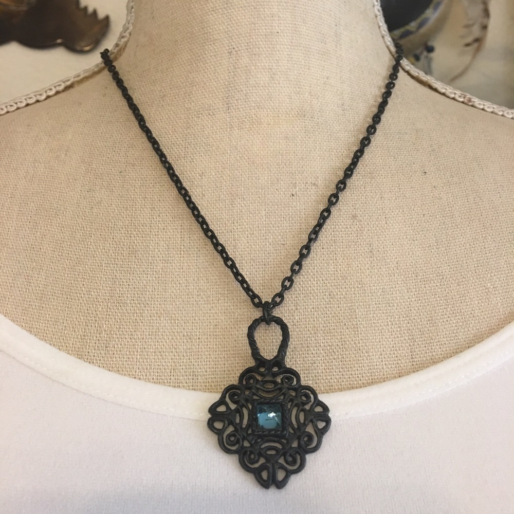 Matte black stone accent amulet on chain